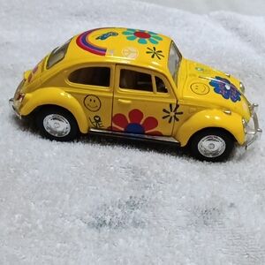 Yellow Toy Car with Colorful Designs